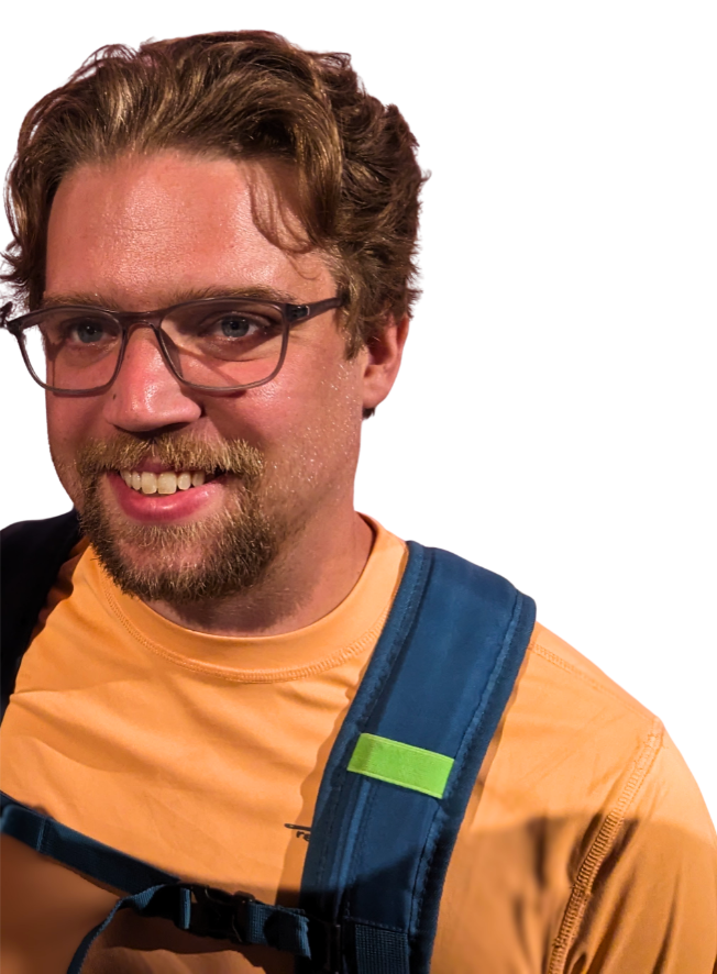 Me smiling in an orange shirt and blue backpack strap, wearing glasses — a friendly developer portrait on a transparent background.